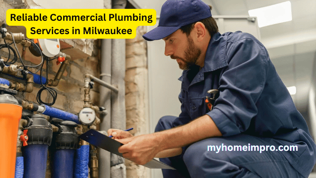 Professional plumber repairing commercial pipes in Milwaukee.